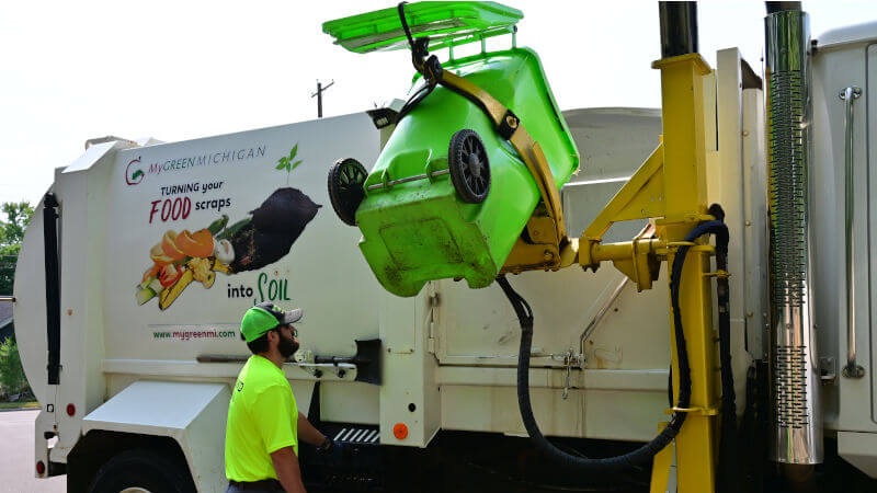 food-waste-collection-truck-picking-up-food-bin